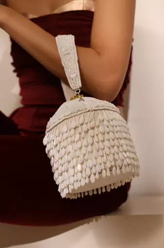White suede round embellished bag with handle