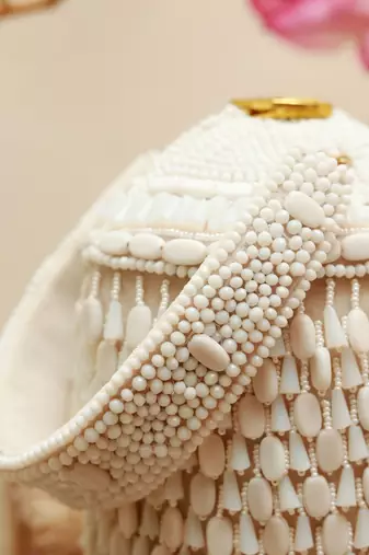 White suede round embellished bag with handle