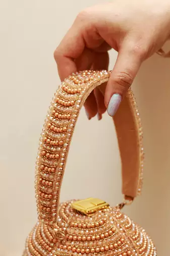 Gold suede round embellished bag with handle