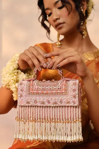 Suede pink flap over bag with handle