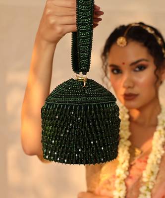 Green suede round embellished bag with handle 1