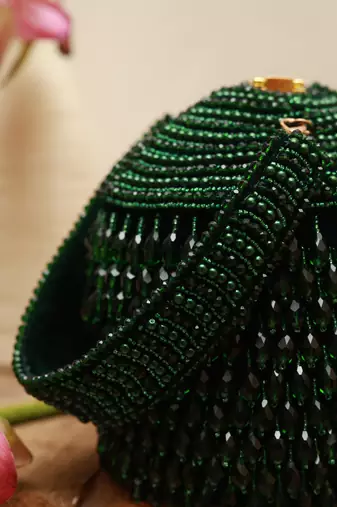 Green suede round embellished bag with handle
