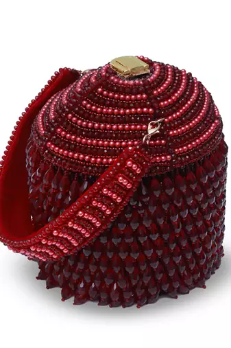 Red suede round embellished bag with handle