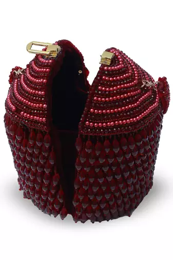 Red suede round embellished bag with handle