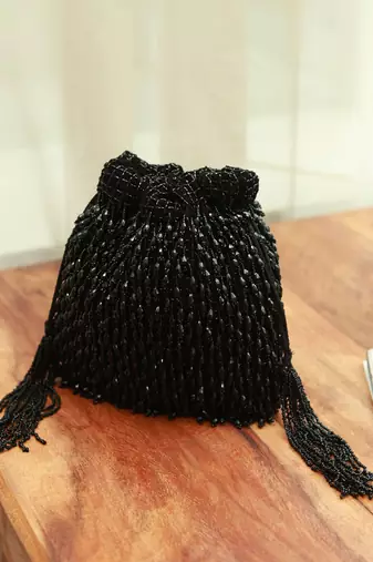 Black suede potli bag with handle