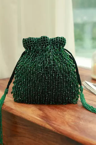 Green suede potli bag with handle