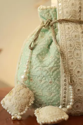 Blue silk potli bag with handle