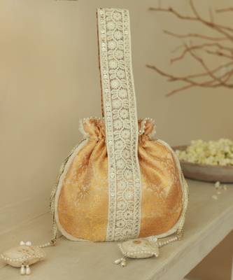 Yellow silk potli bag with handle 1