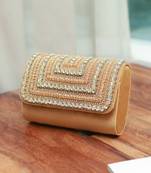 Gold suede embellished flap over clutch bag