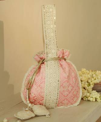Pink silk potli bag with handle 1