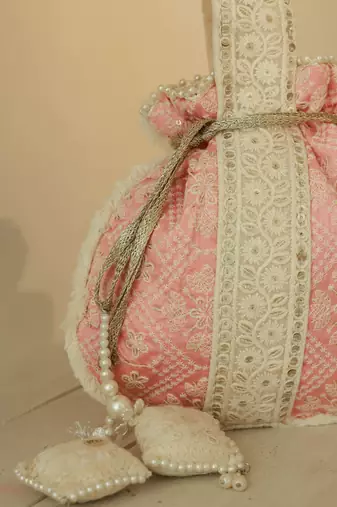 Pink silk potli bag with handle
