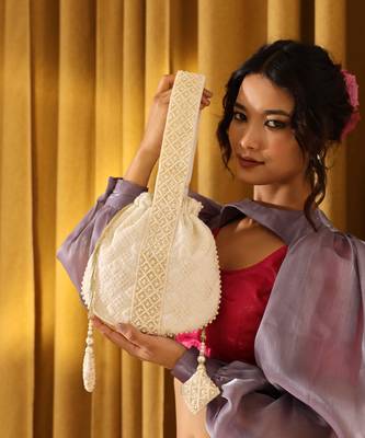 White silk taj embroidered potli bag with handle 1