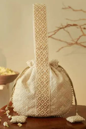 White silk taj embroidered potli bag with handle