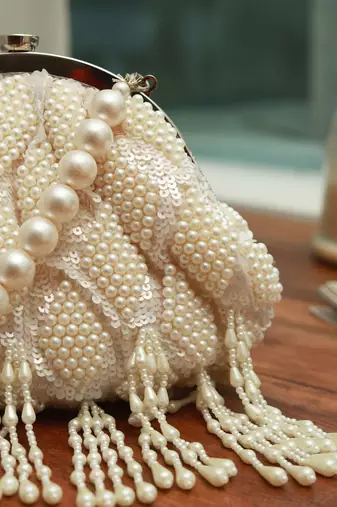 White suede pearl with detachable handle