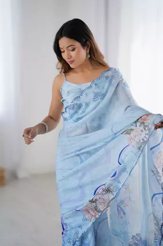Sky blue printed chinon saree with border