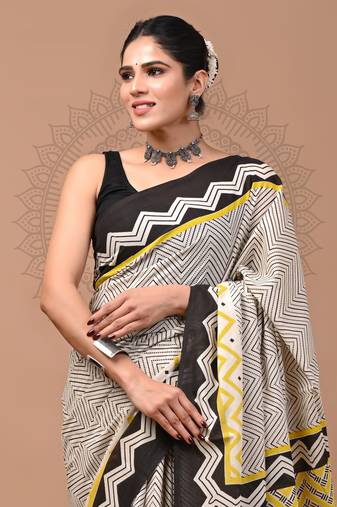 Black   soft cotton block print saree with blouse piece