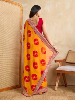 Yellow georgette festive wear saree 2