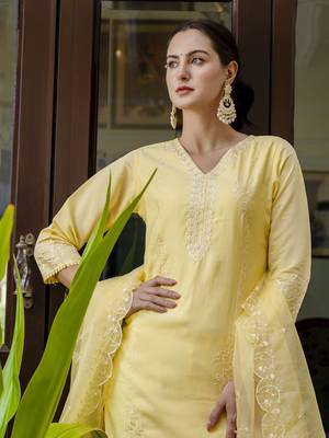 Yellow embroidered viscose roman silk salwar suit 4