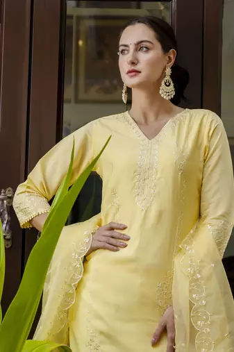 Yellow embroidered viscose roman silk salwar suit