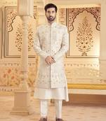Lilac raw silk embroidered sherwani paired with kurta & pant