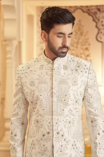 Lilac raw silk embroidered sherwani paired with kurta & pant