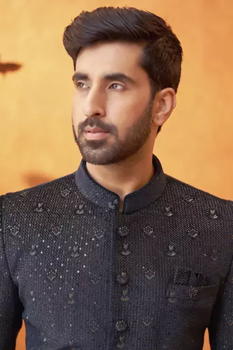 Blue banarasi silk embroidered bandhgala paired with pant