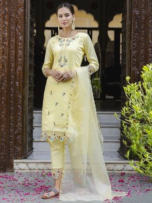 Yellow embroidered viscose roman silk salwar suit 2
