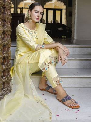 Yellow embroidered viscose roman silk salwar suit 4