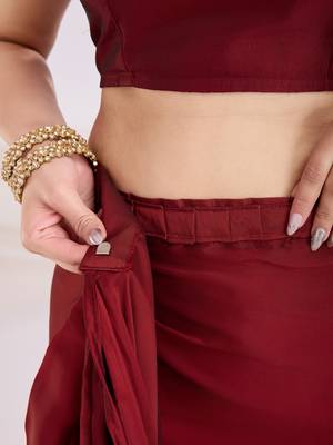 ready made maroon silk blend solid printed saree with lace border 4
