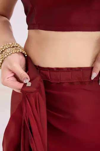 ready made maroon silk blend solid printed saree with lace border