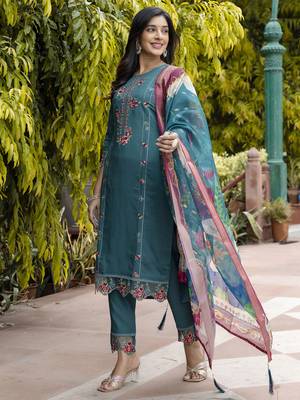 Green embroidered viscose roman silk salwar suit 2