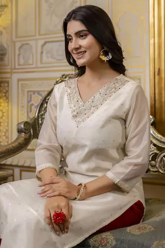 White embroidered shimmer silk salwar suit
