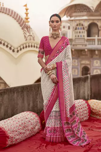 Off white poly viscose silk ikkat printed patola saree with rani pink weaving  border