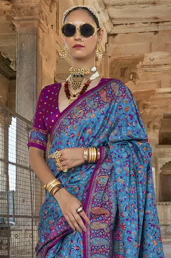 Royal blue poly viscose silk floral printed pashmina saree with paisley design border