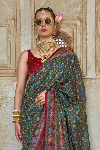 Dark green poly viscose silk floral printed pashmina saree with paisley design border