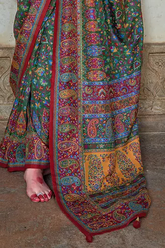 Dark green poly viscose silk floral printed pashmina saree with paisley design border