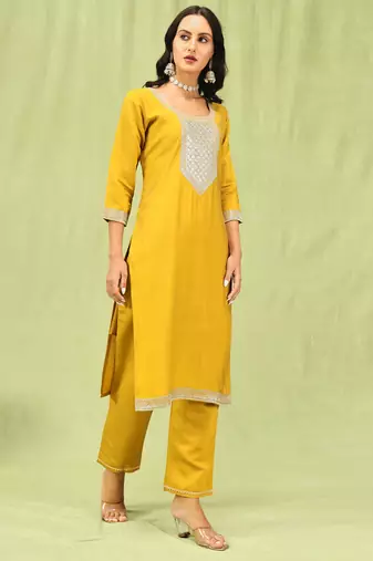 Yellow embroidered viscose roman silk kurta sets