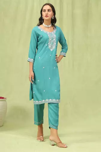 Teal embroidered viscose roman silk kurta sets