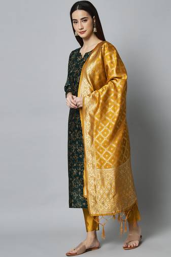 Green embroidered cotton silk self designed salwar suit