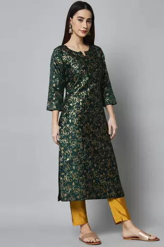 Green embroidered cotton silk self designed salwar suit