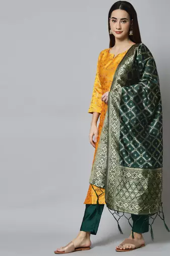 Yellow embroidered cotton silk self designed salwar suit