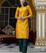 Yellow embroidered cotton silk self designed salwar suit