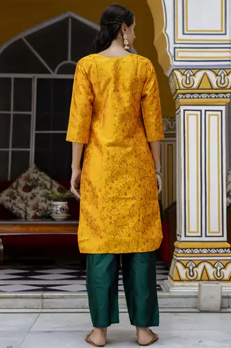 Yellow embroidered cotton silk self designed salwar suit