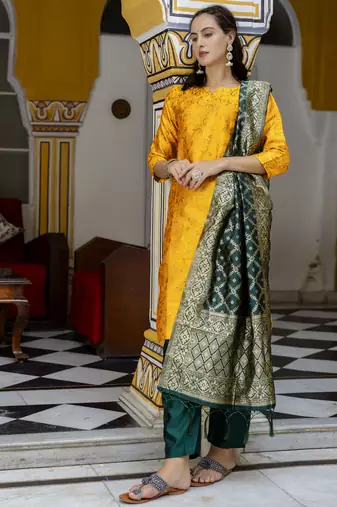 Yellow embroidered cotton silk self designed salwar suit