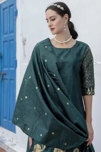 Green embroidered cotton silk jacquard salwar suit