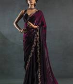 Wine purple to black satin silk blend saree with embroidered zari border