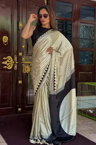 cream and black striped gajji silk blend saree with blouse