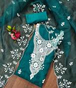 Teal powder organza suit set with intricate white thread embroidery