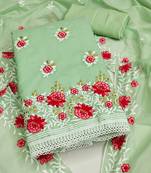 Green Charming chanderi cotton dress material with floral embroidery & lace detailing
