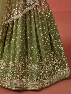 Delightful gradient from warm beige to deep mehndi green sequins zari embroidered georgette indian lehenga 8